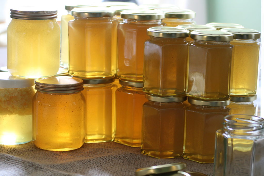 Matthew Davies image of multiple jars of honey