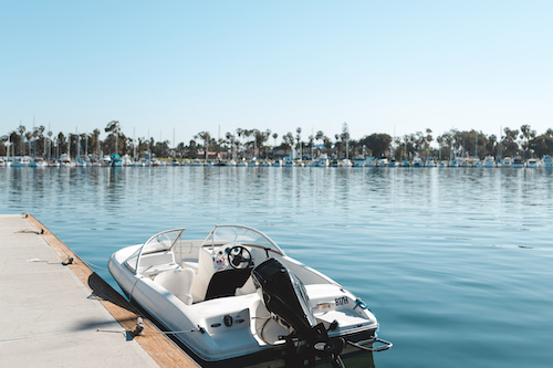 Matthew Davies image of a boat tied to the dock in a marina