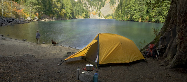Matthew Davies image of a fisherman camping at a wilderness lake