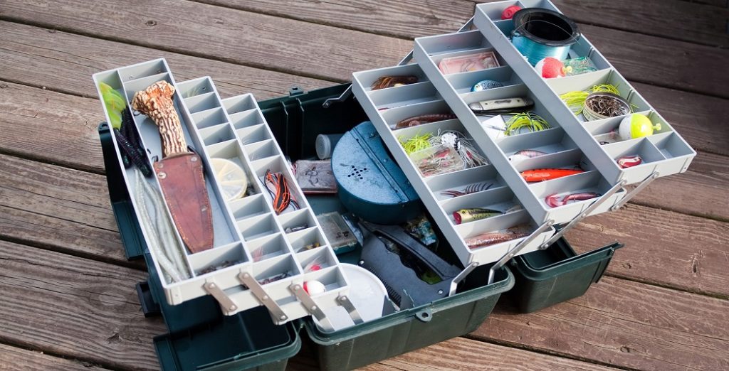 Matthew Davies image of a tackle box on a pier